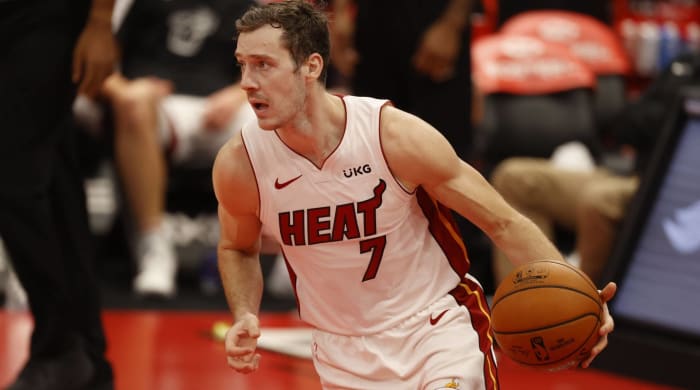 Heat point guard Goran Dragic dribbles a ball in a game.